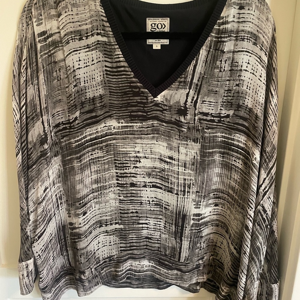 Go by silk. Washable newer wore once. Size S.